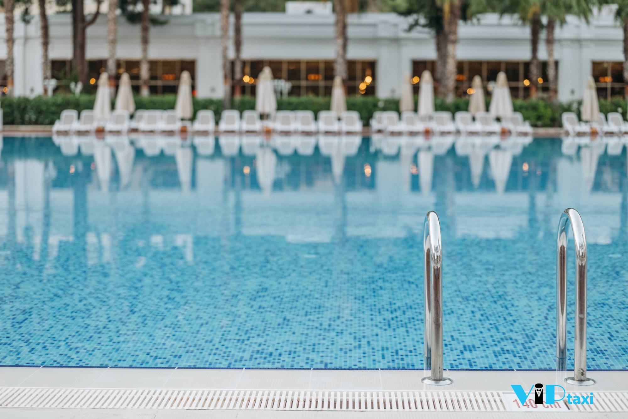 Hotel Pool With Lounge Chairs and Umbrellas