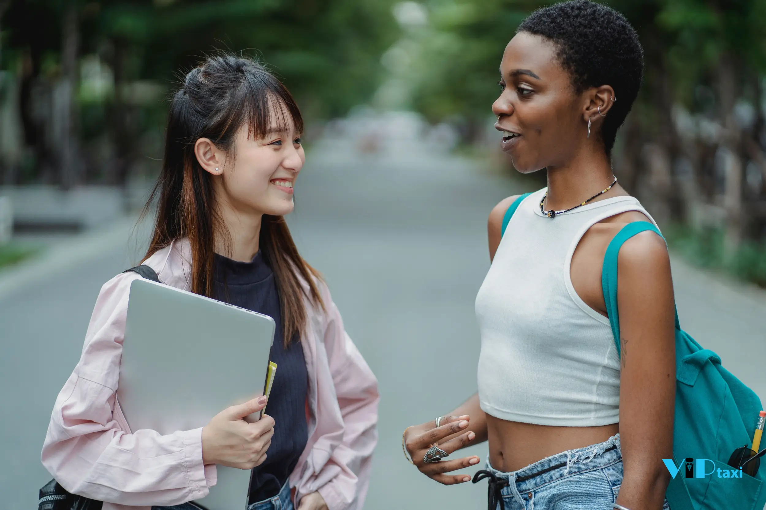 Two College Students Talking on Campus
